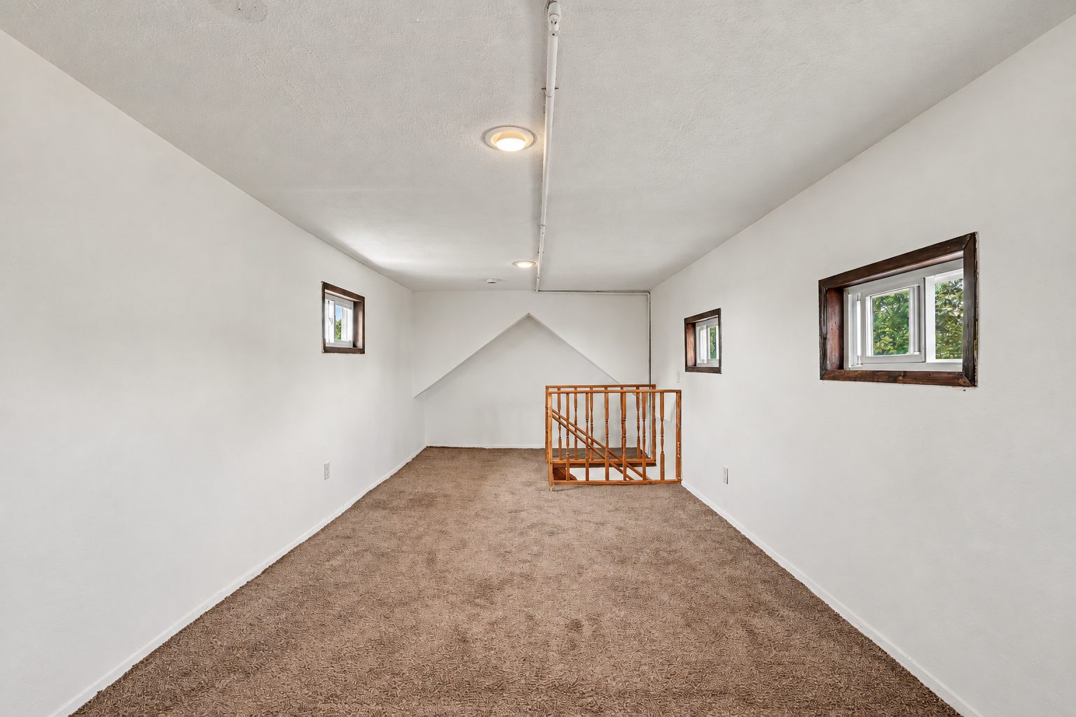 The bonus room in the attic above the second unit