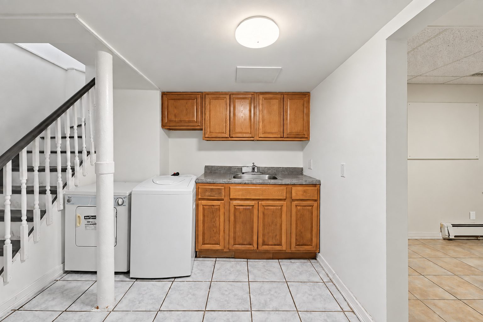 The basement's kitchenette and laundry