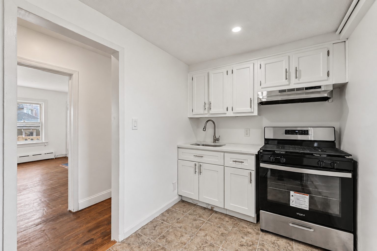 The second unit's kitchen with new appliances